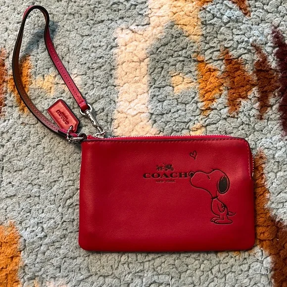 Coach Authentic Snoopy wristlet - Picture 1 of 7